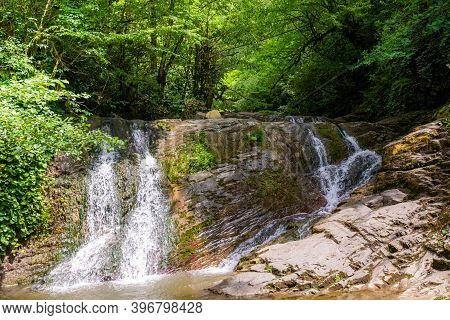 Russia. Sochi. Orekhovsky Waterfall On Bezumenks River - Natural Sight In The Neighborhood Of The Ci