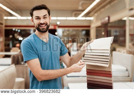 Satisfied Bearded Man Choose Color On Color Palette. Selecting Color Of Mattress On Color Palette Gu