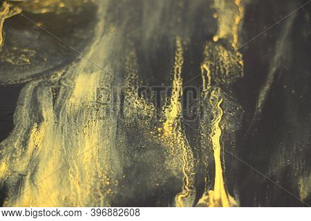 Black And Yellow Pigments Difusion Into Each Other Abstract Colorful Vivid Background