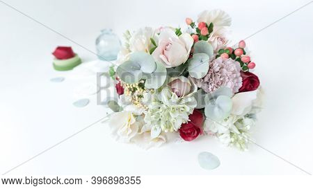 An Elegant Bouquet Of Artificial Flowers Made Of Foamiran On A Pale Blue Pastel Background With Copy
