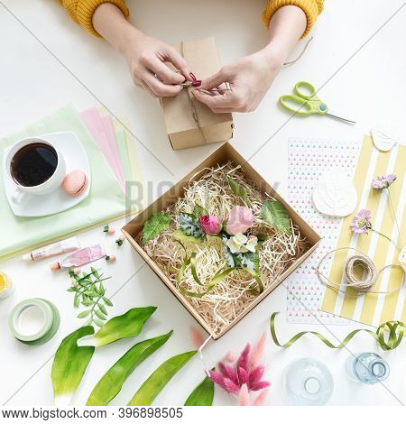The Girl Packs The Handicrafts To Send To The Customer Who Has Made An Order Via The Internet. Onlin