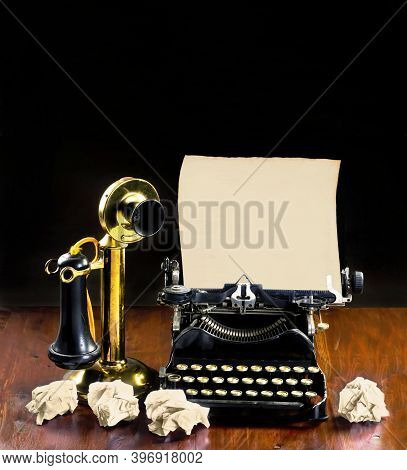 Antique Typewriter And Old Brass Stick Telephone With Room For Your Type.
