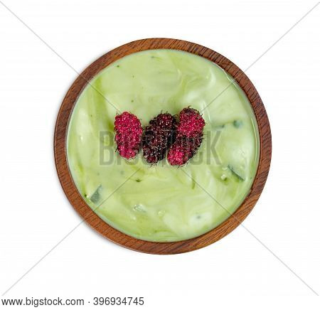 Yoghurt Mix Green Tea Flavor Powder With Nata De Coco Dutchie And Mulberries Fruit In Wooden Bowl Is