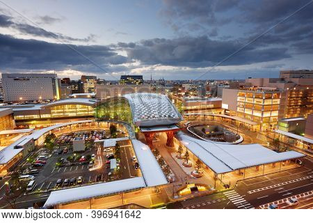 Kanazawa, Japan downtown city skyline in winter at twilight over the station.