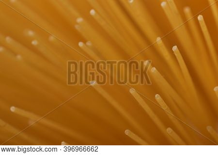 A Macro Photograph Of Several Unboiled Spaghetti