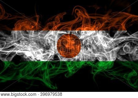 Niger, Nigerien Smoke Flag Isolated On Black Background