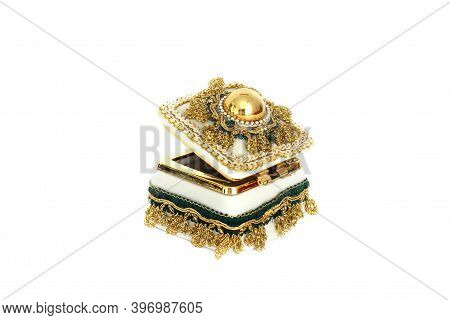 Jewelry Casket. Jewelry Casket On A White Background. An Open Casket