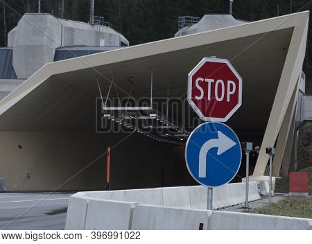 A Car Tunnel On The Road, Passageway Through A Mountain