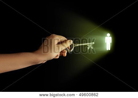 Hand with key