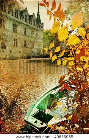 autumn castle beside water - artistic picture