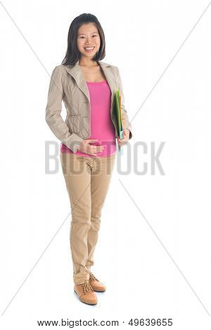Full body six months pregnant Asian businesswoman holding file folder document standing isolated on white background.