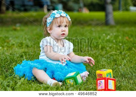 Little Girl With Toys