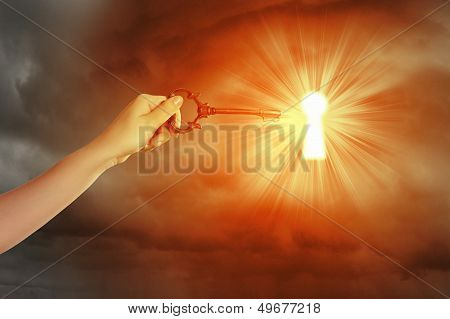 Hand with key