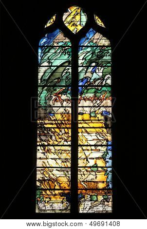 PARIS, FRANCE - NOV 07, 2012: Abstract stained glass, church is dedicated Gervasius and Protasius is one of the oldest in Paris. Known for its richly painted stained glass, Paris on Nov 07, 2012