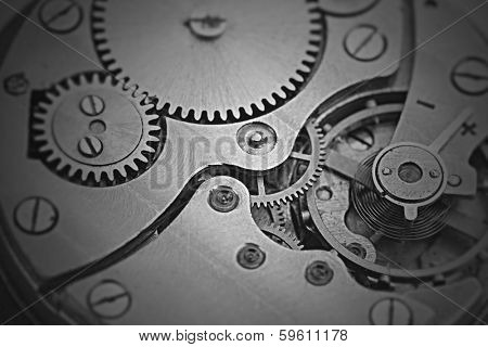 Clockwork details, pinions and wheels closeup