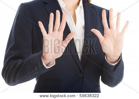 Beautiful caucasian business woman showing stop gesture. Isolated on white.