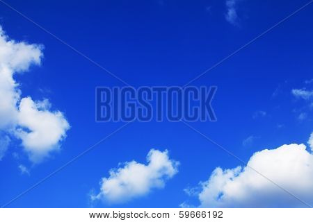 Blue Sky Background With Tiny Clouds