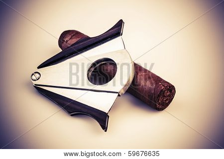Cigar And Cutter On A White Background