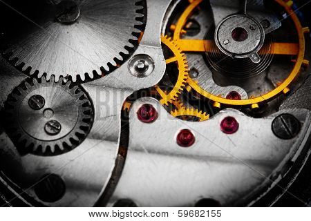 Clockwork details, pinions and wheels closeup
