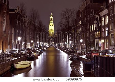 City scenic from Amsterdam in the Netherlands with the Zuiderkerk at night