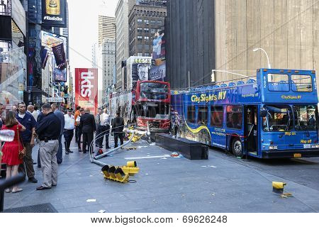 Downed streetlight, TKTS booth & buses