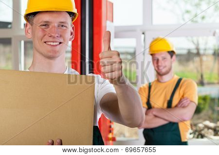 Blue-collar Worker Showing Thumbs Up Sign