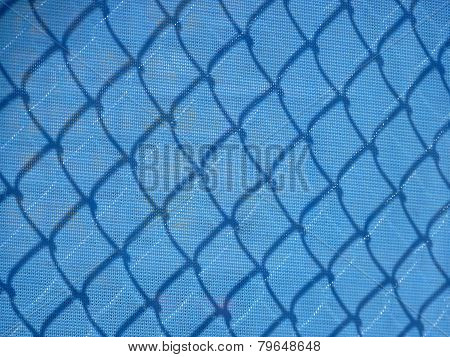 Blue mesh construction fence