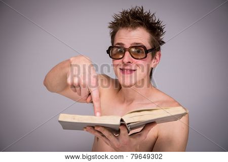man with a book and glasses