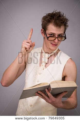 man with a book and glasses