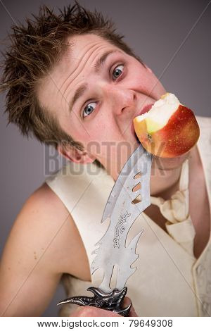Man with a dagger in studio
