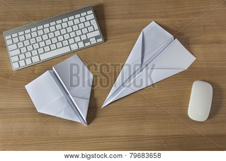 Paper Plane On An Office Desk