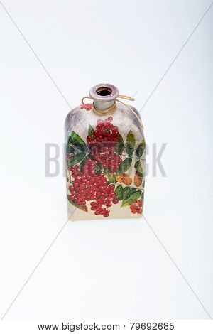 bottle decorated using different techniques of decoupage