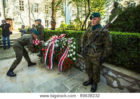 KRAKOW, POLAND - MAY 3, 2015: Polish soldiers at ceremony of laying flowers to monument to Hugo Kollataj during annual Polish national and public holiday the May 3rd Constitution Day (of May 3, 1791)