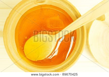 Honey In A Wooden Bowl