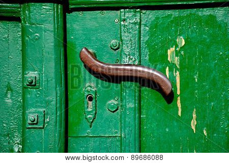 Doorhandle On A Green Door