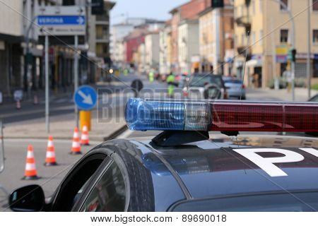 Blue And Red Flashing Sirens Of Police Car During The Roadblock
