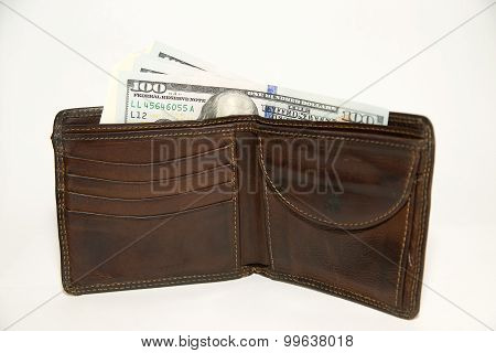 Old Wallet With Banknotes Of Us Dollars Inside
