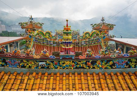 Decoration On The Roof Of Quanji Temple, Jiufen, Taiwan.  The Temple With The Largest Statue Of Guan