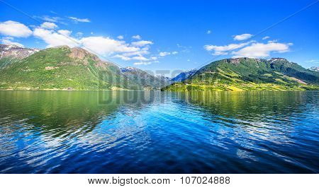 Meadows And Village On Hardanger Fiord.