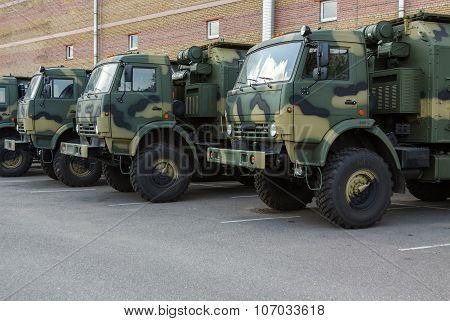 new military trucks on the parking lot
