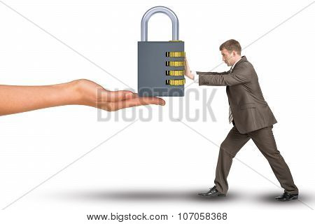 Hand giving keylock to businessman