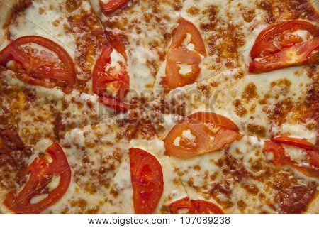 Delicious Italian Pizza Margherita with Tomatoes Close-up