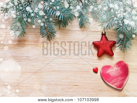Tree Branches With Stars, Heart And Snow On Wooden Board