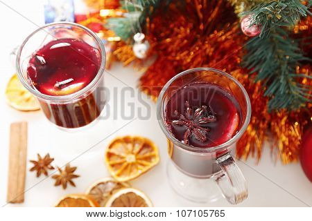 mulled wine with decorated christmas tree