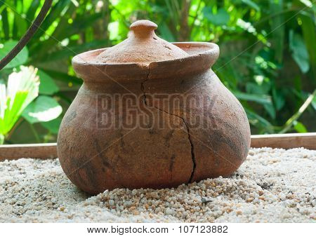 Broken Clay Pots Or Porttery On A White Sand Outside Kitchen Room