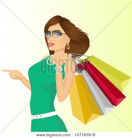 young haughty woman with shopping bags