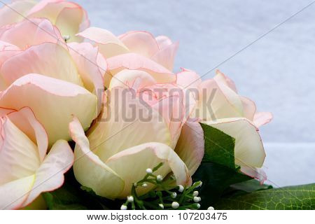 Pink Artificia Flower On White Cloth Background