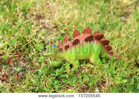 dinosaur in the grass