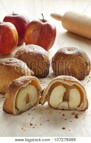 Fresh baked traditional Dutch apple dumplings in half