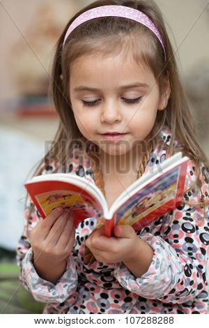 Girl Looking At Book